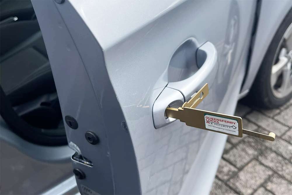 Car Locksmith Edinburgh gaining safe access to a locked car without damaging the lock.
